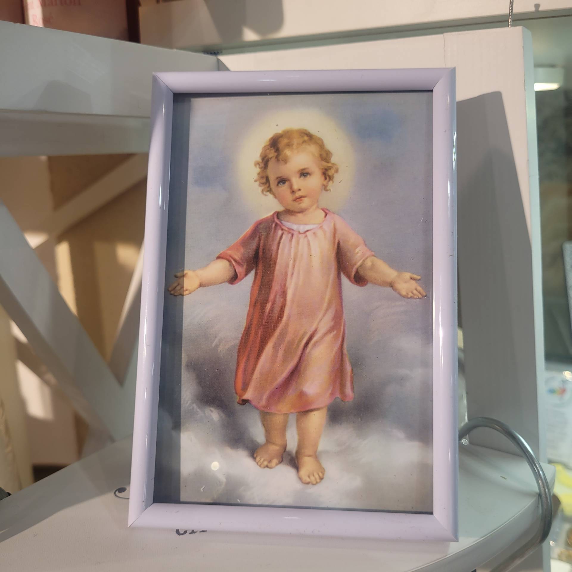 Gyerekszobába GYERMEK JÉZUS FEHÉR KERETBEN 